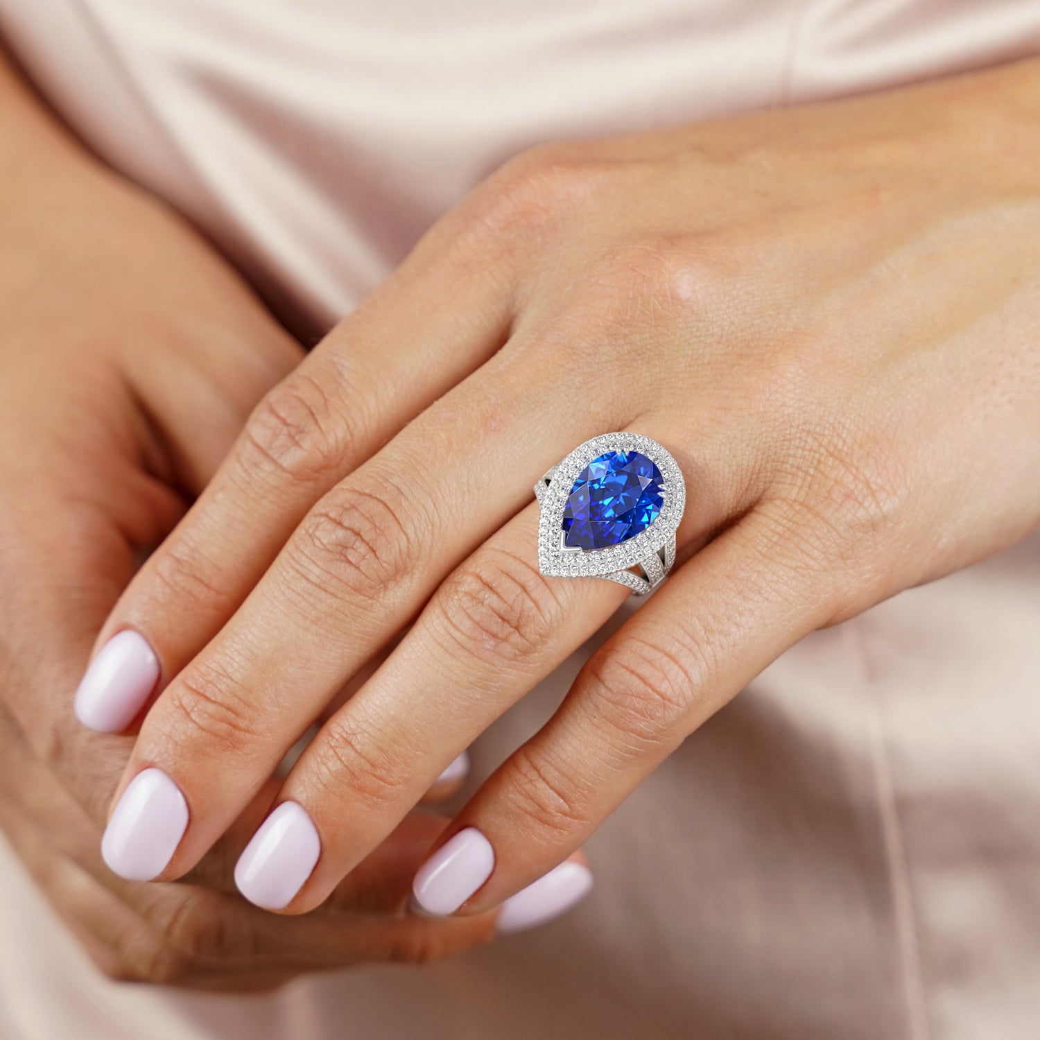 Pear Cut Tanzanite and Double Halo Diamond Ring