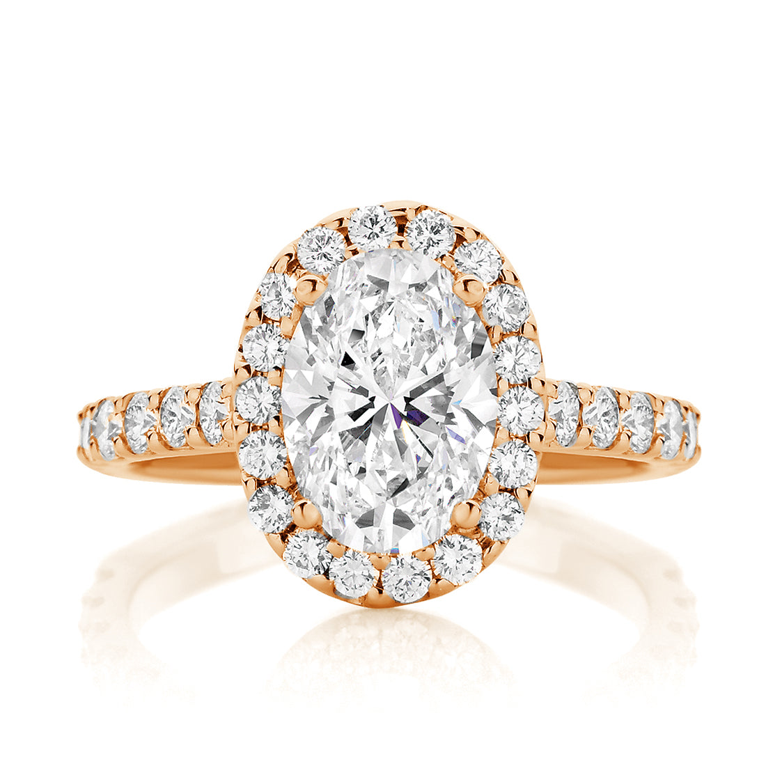 Oval Cut Diamond with Seamless Halo Engagement Ring