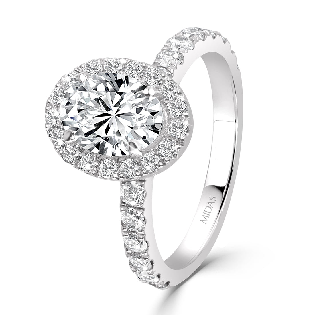 Oval Cut Diamond with Seamless Halo Engagement Ring