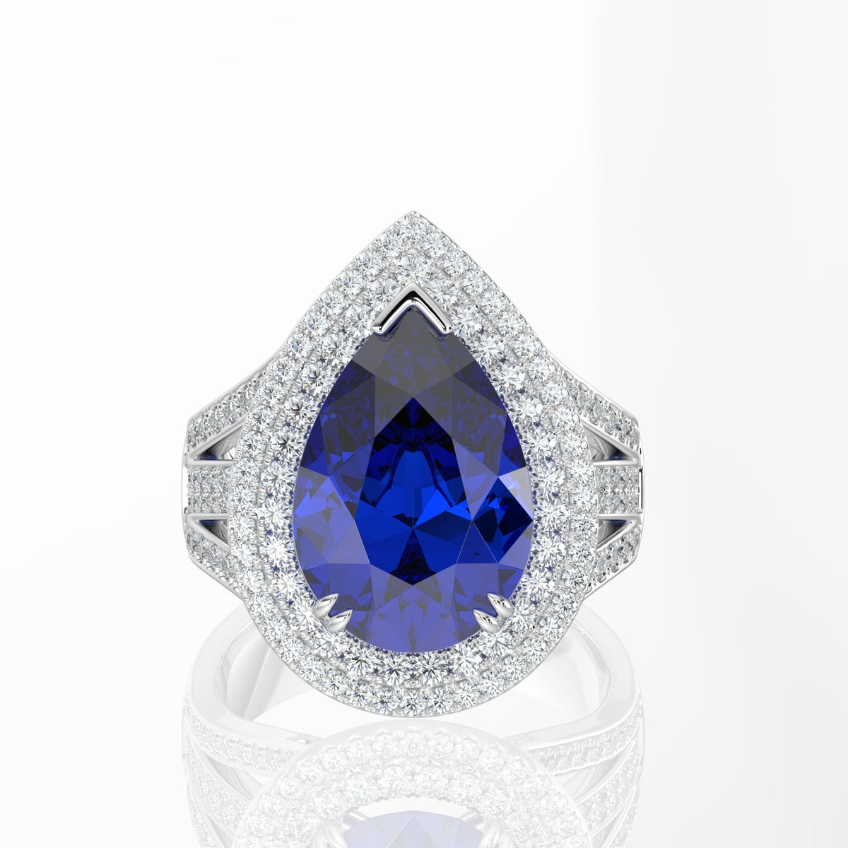 Pear Cut Tanzanite and Double Halo Diamond Ring