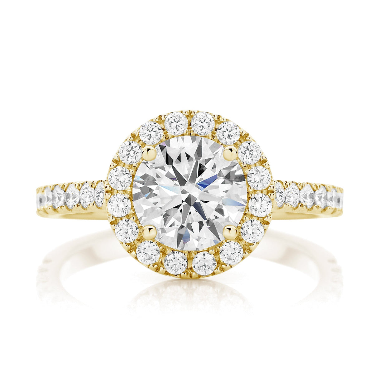 Round Brilliant with Claw Set Halo Engagement Ring