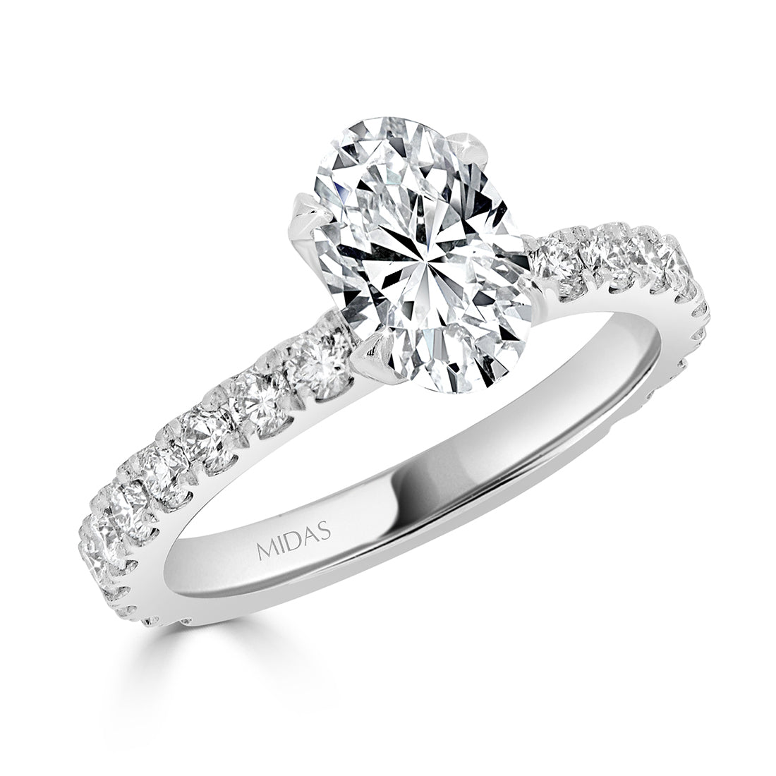 Oval Cut with Four Claw Set Diamond Engagement Ring