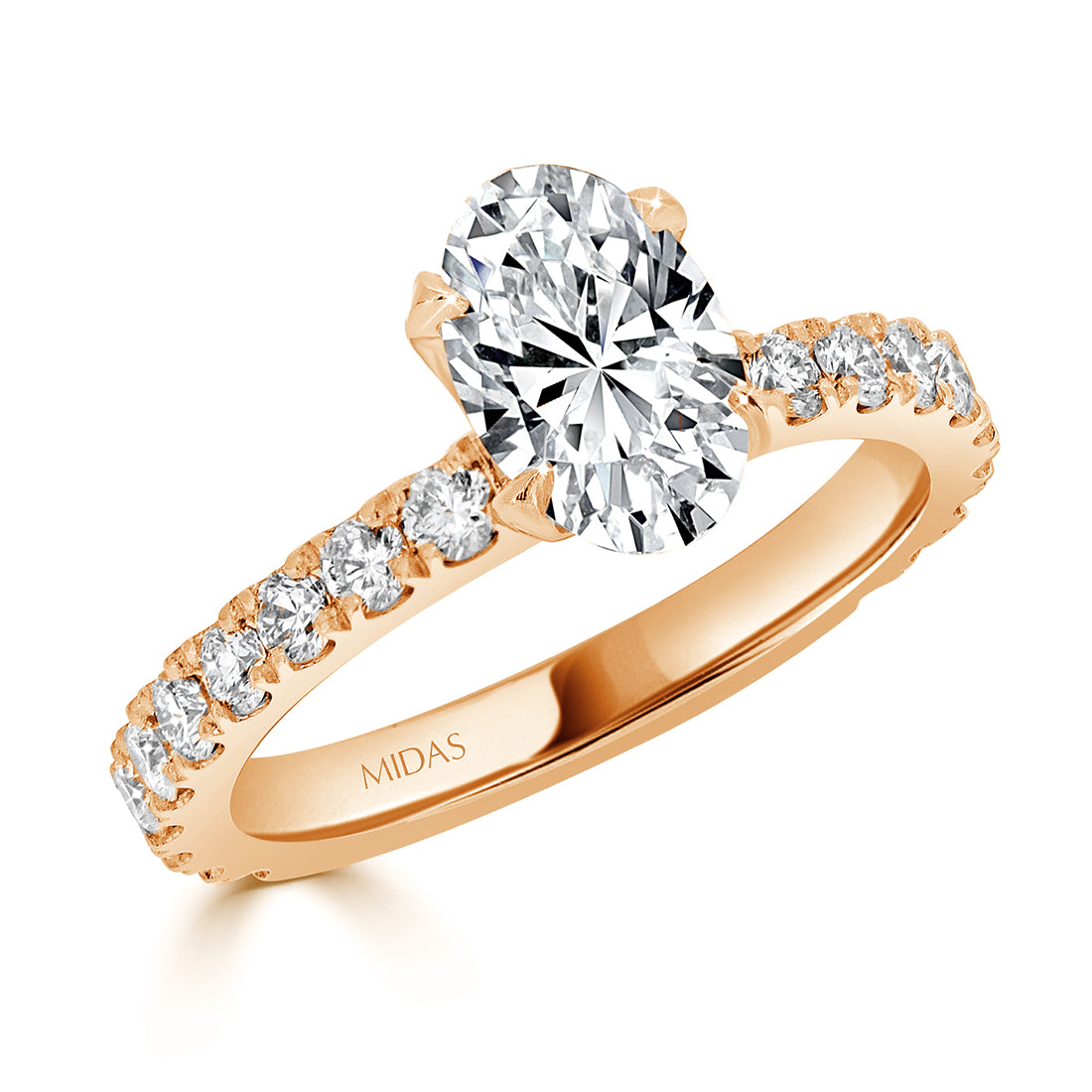 Oval Cut with Four Claw Set Diamond Engagement Ring