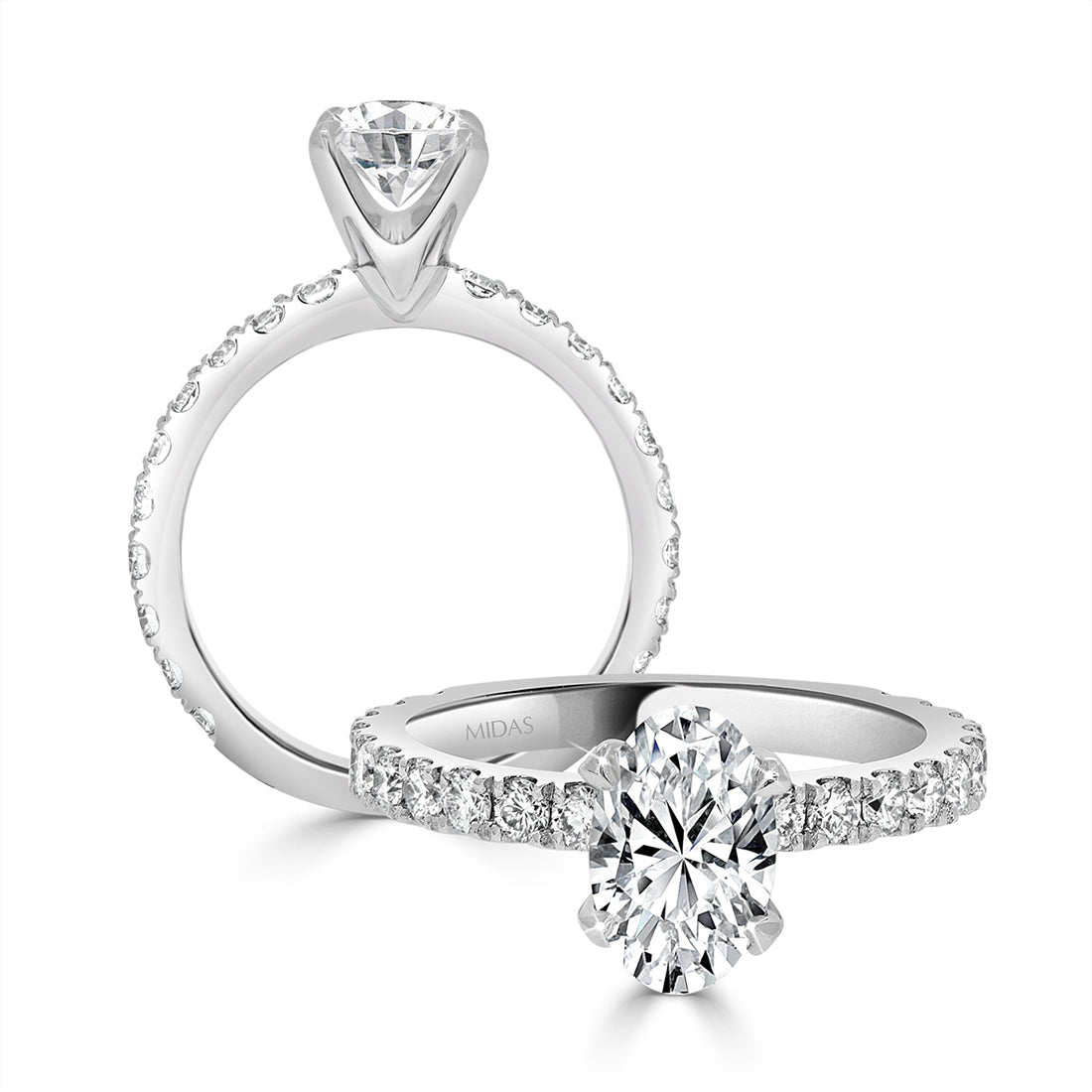 Oval Cut with Four Claw Set Diamond Engagement Ring