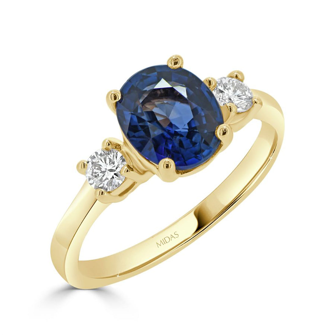 Oval Cut Sapphire and Round Diamond Trilogy Ring