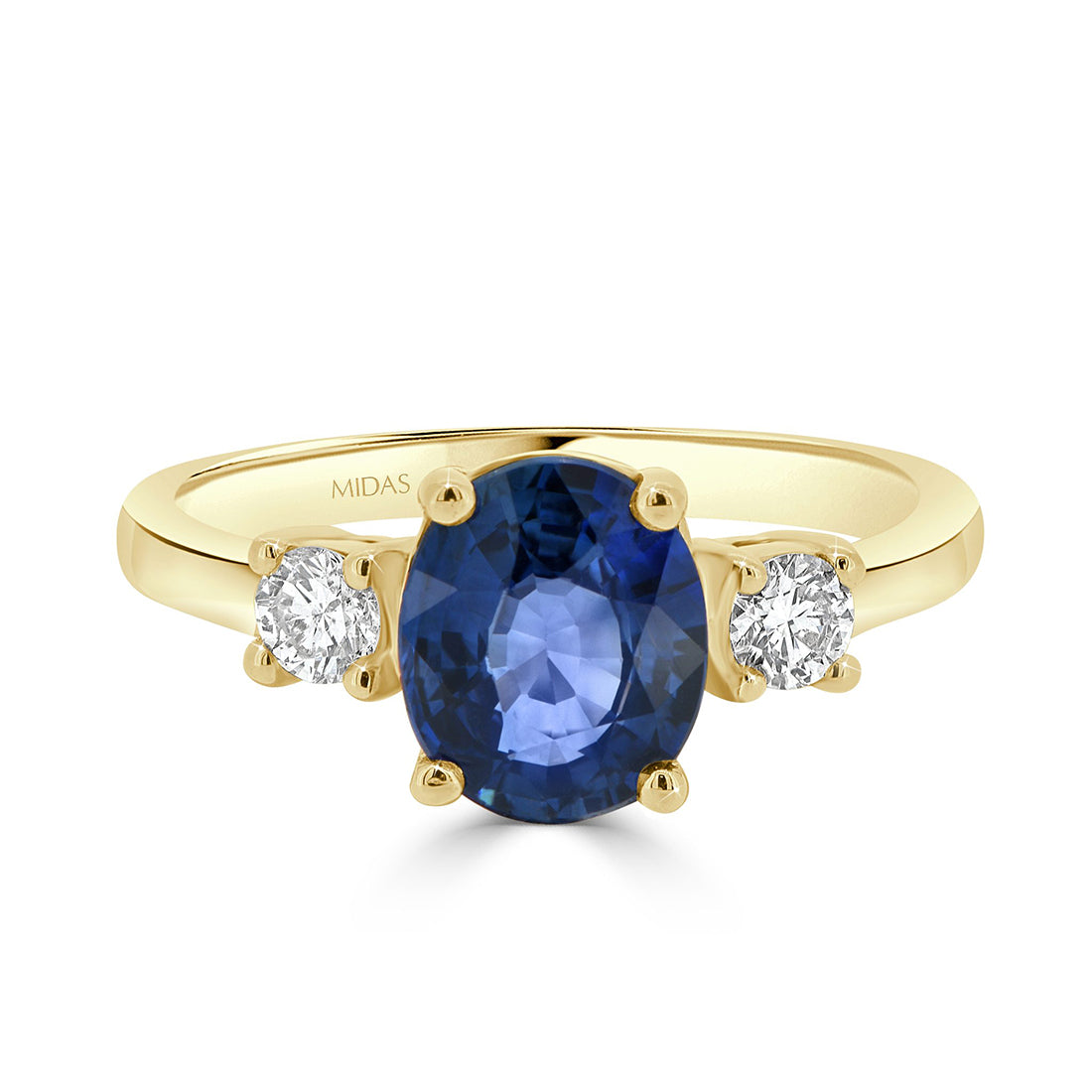 Oval Cut Sapphire and Round Diamond Trilogy Ring