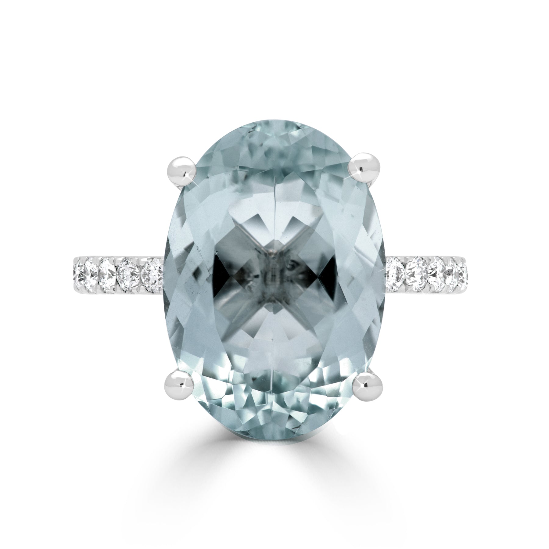 Oval Cut Aquamarine and Round Brilliant Diamond Claw Set Dress Ring