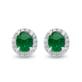 Four Claw Oval Cut Emerald and Diamond Halo Stud Earrings
