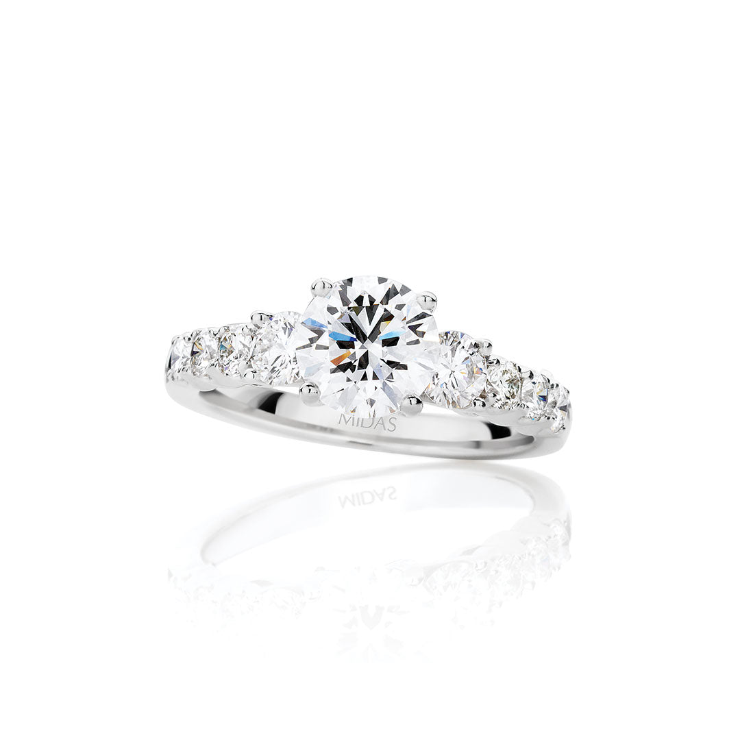 Round Brilliant Cut Three-Stone Diamond Engagement Ring