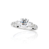 LG Round Brilliant Cut Three-Stone Diamond Engagement Ring