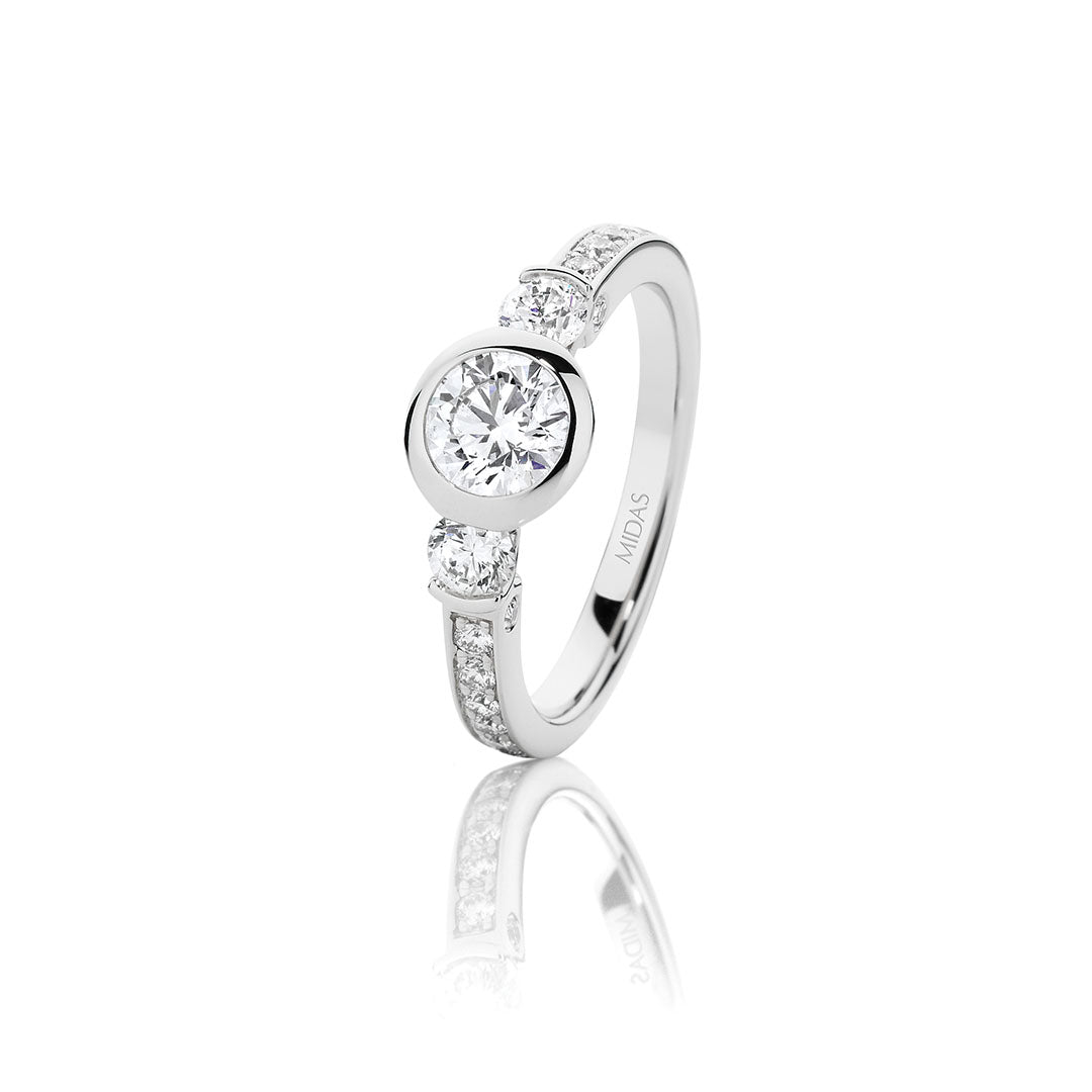 Round Brilliant Cut Three-Stone Pavé Engagement Ring