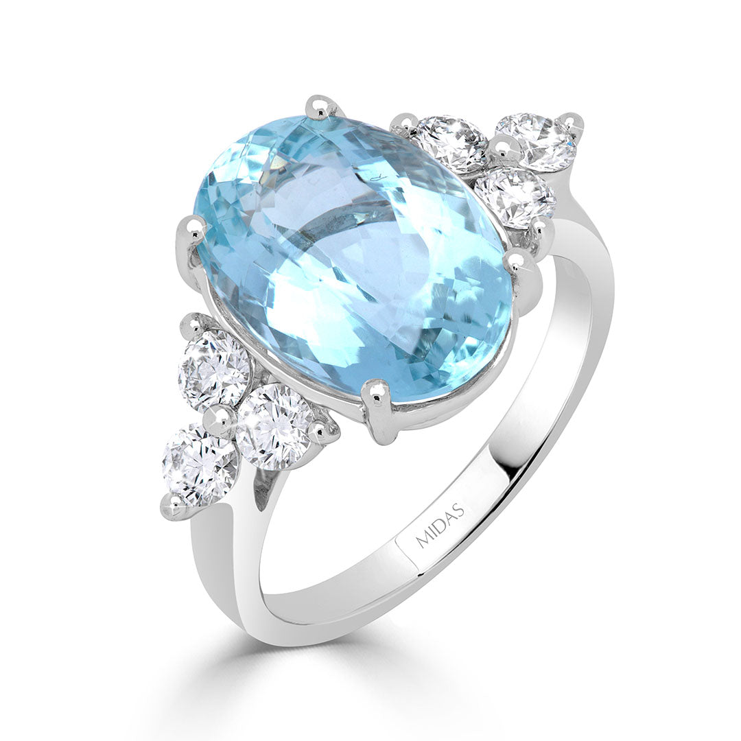 Oval Cut Blue Topaz and Diamond Cluster Dress Ring