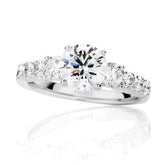 LG Timeless Round Brilliant Trilogy Engagement Ring