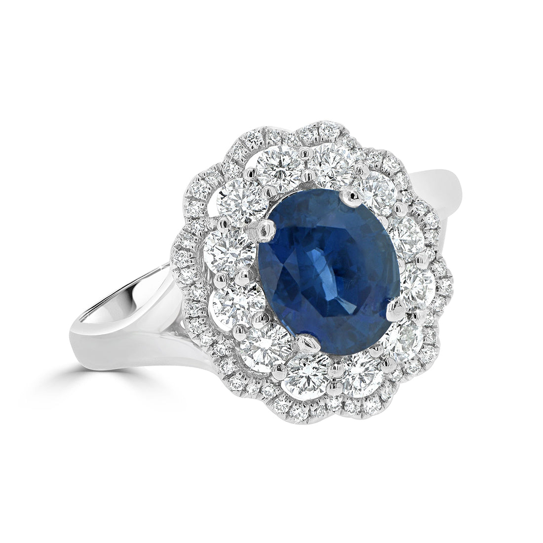 Oval Cut Sapphire and Diamond Double Halo Flower Ring