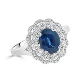 Oval Cut Sapphire and Diamond Double Halo Flower Ring