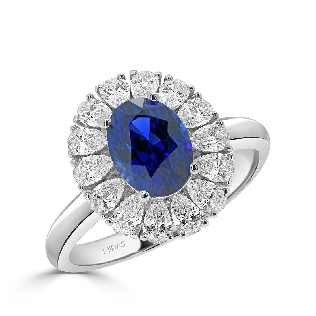 Oval Sapphire with Pear Diamond Halo Engagement Ring